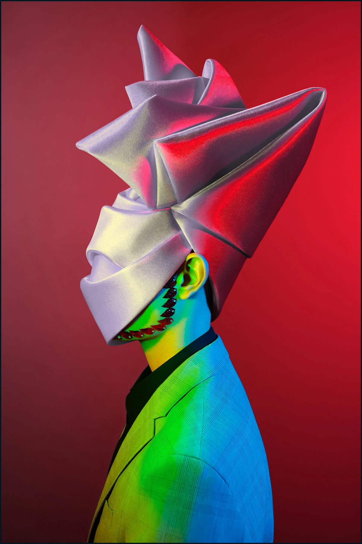 Metamorphoses Envoy portrait with a silver headpiece against a red field
